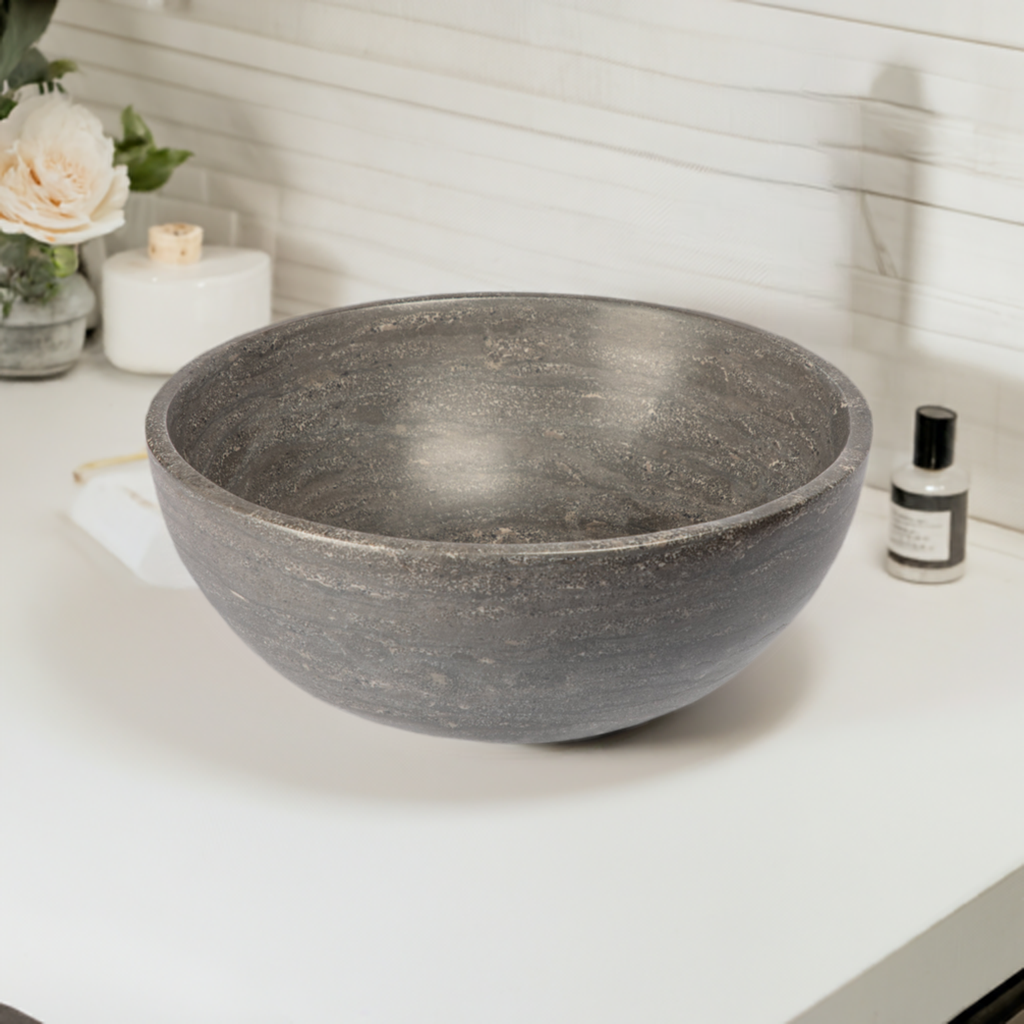 Round black limestone bathroom vessel sink